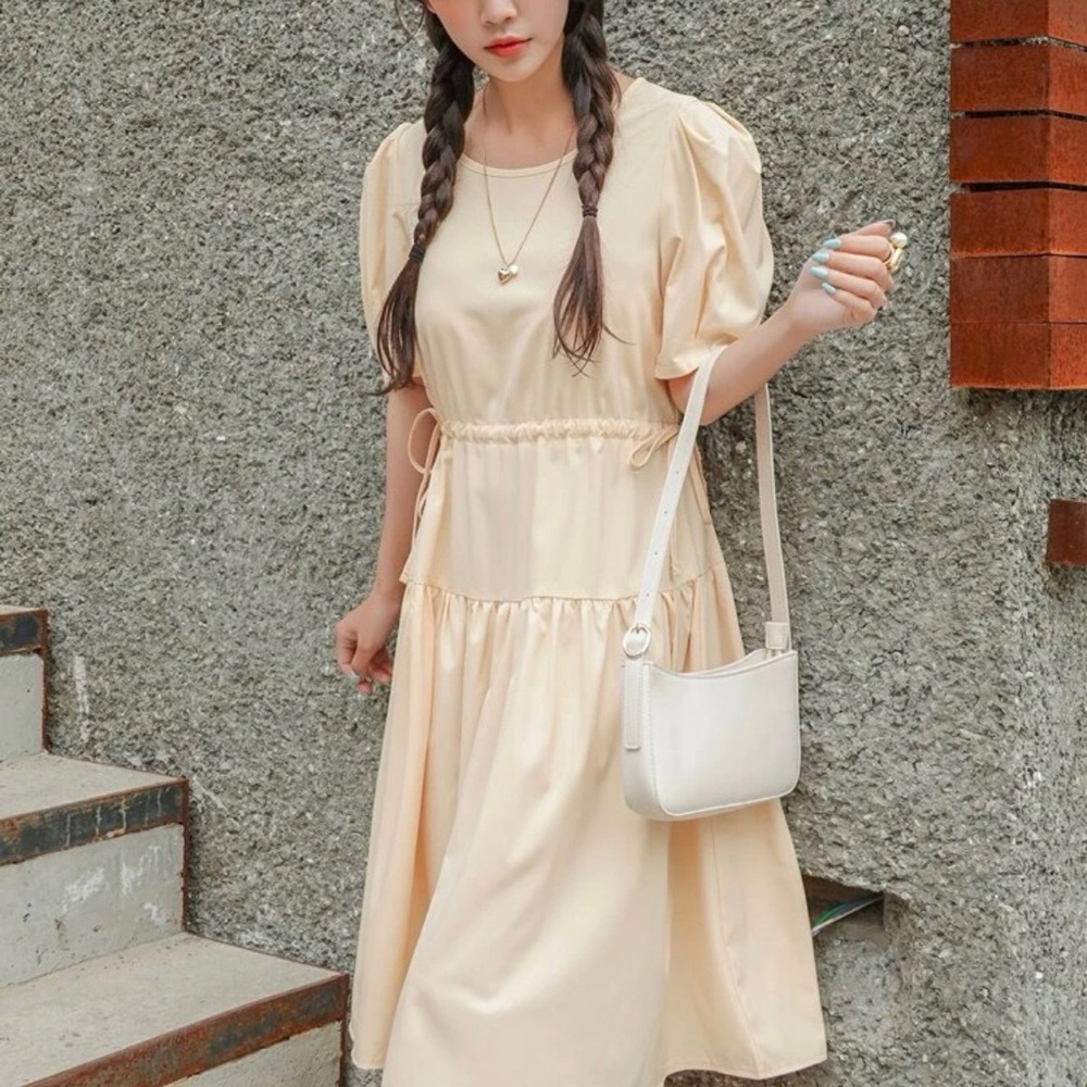 This cream colored dress is from DAZY